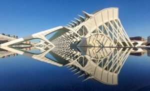 Spiky building with reflection in water