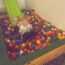 2 small boys in an indoor play centre ball pit