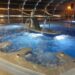 Large spa swimming pool with bubbles and water jets